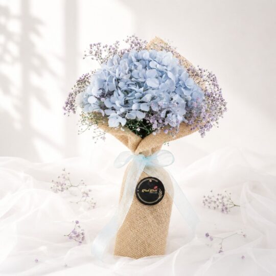 Elegant blue hydrangea bouquet with lavender baby's breath for premium flower delivery in Bangalore.