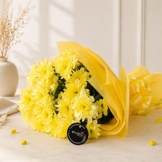 Premium yellow chrysanthemum bouquet wrapped in elegant yellow paper for flower delivery in Bangalore.