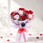 Premium bouquet of red and blush pink roses with pink baby's breath for flower delivery in Bangalore.
