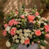 Premium pink rose, carnation, and chrysanthemum floral arrangement for online flower delivery in Bangalore.