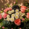 Premium pink rose, carnation, and chrysanthemum floral arrangement for online flower delivery in Bangalore.