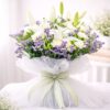 Luxury white lily and purple flower bouquet with roses for same day flower delivery Bangalore by premium florist FreshKnots.