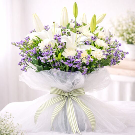 Luxury white lily and purple flower bouquet with roses for same day flower delivery Bangalore by premium florist FreshKnots.