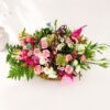 Pastel flower basket Bangalore with roses eustoma carnations and seasonal blooms for same day flower delivery