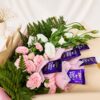 Chocolate bouquet Bangalore with Dairy Milk chocolates, eustoma and spray carnations for same day flower delivery