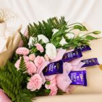 Chocolate bouquet Bangalore with Dairy Milk chocolates, eustoma and spray carnations for same day flower delivery