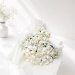 White rose bouquet Bangalore with baby's breath and fresh seasonal greens for same day flower delivery