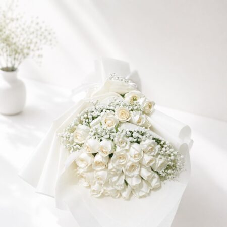 White rose bouquet Bangalore with baby's breath and fresh seasonal greens for same day flower delivery