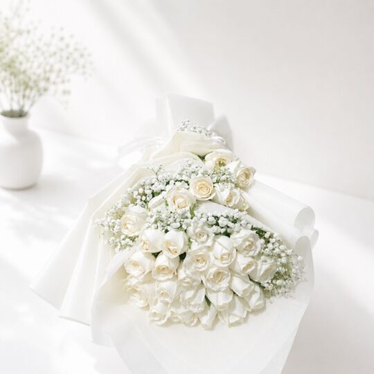 White rose bouquet Bangalore with baby's breath and fresh seasonal greens for same day flower delivery