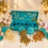 Dry fruit gift box in Bangalore with 3 teal printed tins in a satin-lined teal keepsake box