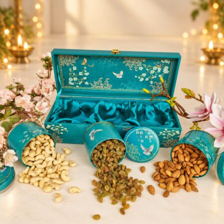 Dry fruit gift box in Bangalore with 3 teal printed tins in a satin-lined teal keepsake box