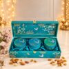 Dry fruit gift box in Bangalore with 3 teal printed tins in a satin-lined teal keepsake box