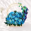 Blue flower basket Bangalore with blue orchids, chrysanthemums and baby's breath for same day flower delivery