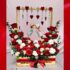 Valentine gift with red roses and porcelain couple statue