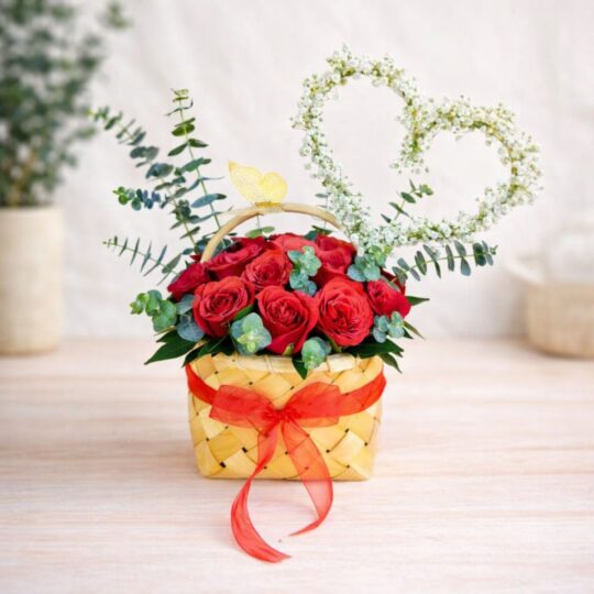 Red rose basket arrangement with heart design for same day flower delivery Bangalore by premium florist.