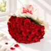 Classic Red Symphony bouquet close-up, red ribbon Bangalore
