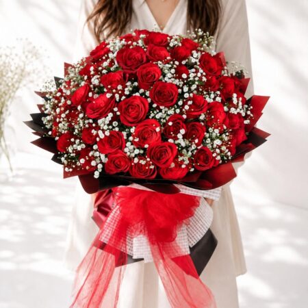 Premium red rose bouquet by FreshKnots Florist – romantic flower bouquet with same-day flower delivery in Bangalore.