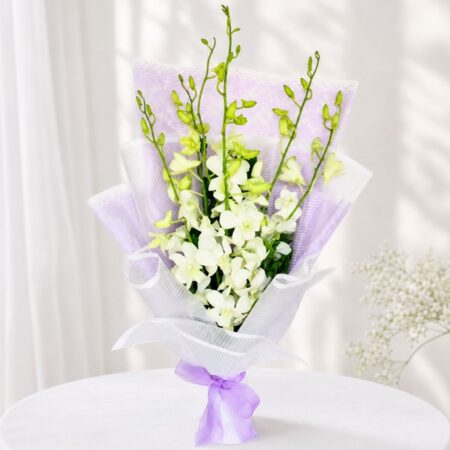 White orchid bouquet in lilac wrap for same day flower delivery Bangalore