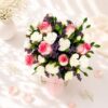 Premium pink rose, white eustoma and purple statice flower arrangement in a glass vase for flower delivery in Bangalore.