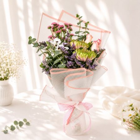 Elegant blush flower bouquet with roses chrysanthemums daisies calimero and eucalyptus for same day flower delivery in Bangalore