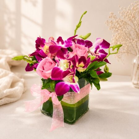 Close up of Orchid Whimsy rose and orchid vase arrangement, Bangalore flower delivery