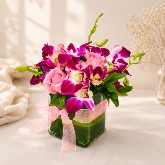 Close up of Orchid Whimsy rose and orchid vase arrangement, Bangalore flower delivery