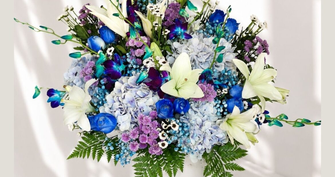 Luxury gift hamper for men with premium chocolates, flowers and elegant blue themed gifting box for same day delivery in Bangalore.