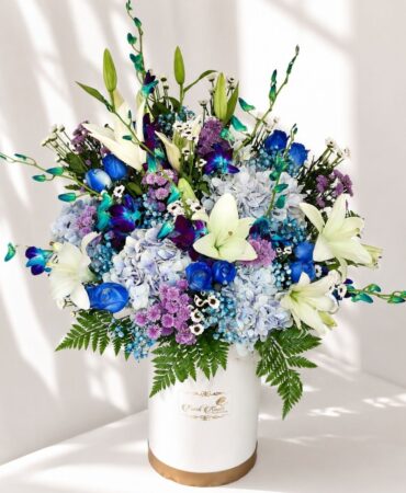 Luxury gift hamper for men with premium chocolates, flowers and elegant blue themed gifting box for same day delivery in Bangalore.