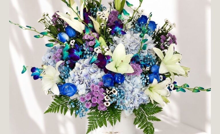 Luxury gift hamper for men with premium chocolates, flowers and elegant blue themed gifting box for same day delivery in Bangalore.