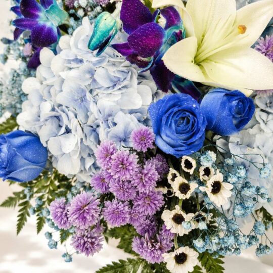 Luxury gift hamper for men with premium chocolates, flowers and elegant blue themed gifting box for same day delivery in Bangalore.