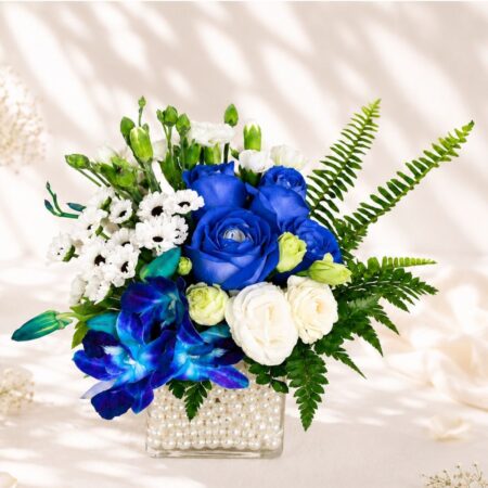 Close-up of blue rose vase arrangement, Bangalore