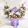 Luxury rainbow flower box arrangement with mixed fresh flowers in pastel shades for premium flower delivery in Bangalore.
