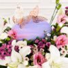 Luxury rainbow flower box arrangement with mixed fresh flowers in pastel shades for premium flower delivery in Bangalore.