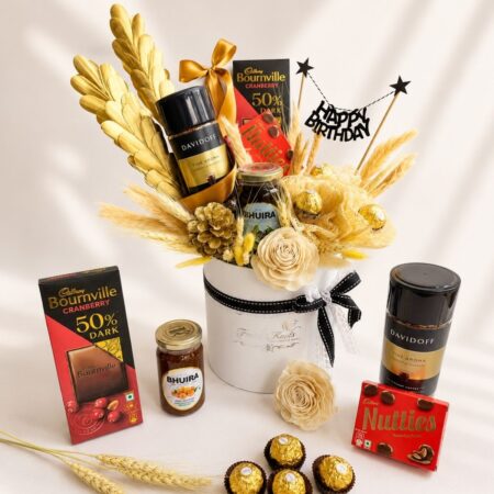 Luxury birthday gift hamper with gourmet treats, coffee-themed elements, and premium celebration gifting in Bangalore.