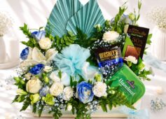 Luxury cake and flower hamper with fresh flowers and gourmet treats for premium gifting in Bangalore.