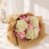 Elegant hydrangea bouquet with pastel roses, baby’s breath, and rustic burlap wrapping for premium flower delivery in Bangalore.