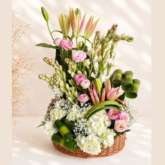 Elegant flower basket with lilies, eustoma, hydrangea, and white blooms by premium florist in Bangalore