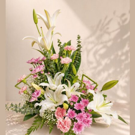 Lily basket arrangement Bangalore with fresh blooms for same day flower delivery
