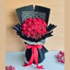 Black and red rose bouquet with lace detailing, FreshKnots luxury flowers, premium bouquet for gifting in Bangalore.