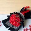 Black and red rose bouquet with lace detailing, FreshKnots luxury flowers, premium bouquet for gifting in Bangalore.