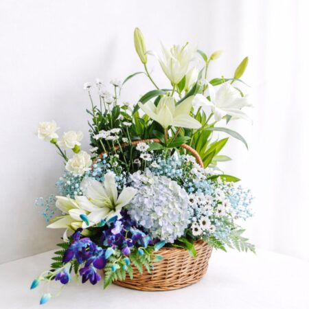 Basket of Exotic Flowers in Blue available for Same Day Delivery