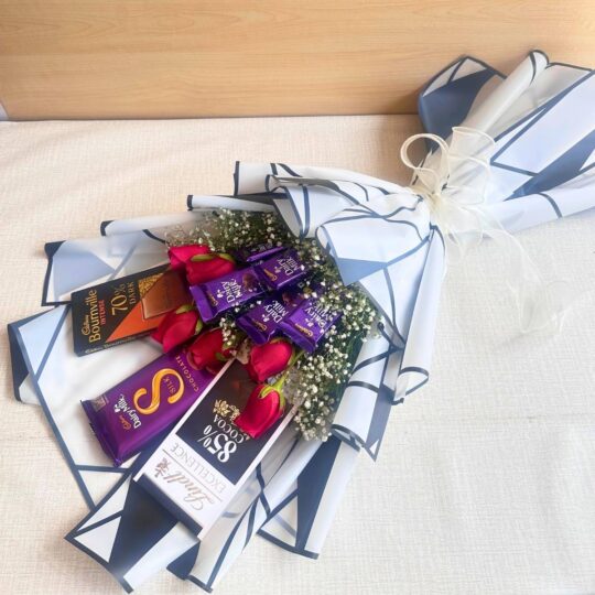 Chocolate bouquet with red roses and assorted premium chocolates – Cadbury Dairy Milk, Lindt, and Bournville – FreshKnots Bangalore