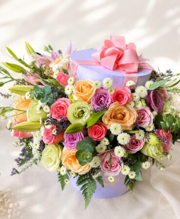Pastel flower box Bangalore with roses lilies eustoma for same day flower delivery