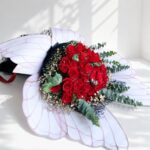 Luxury red rose bouquet with designer wrapping for same day flower delivery in Bangalore by FreshKnots