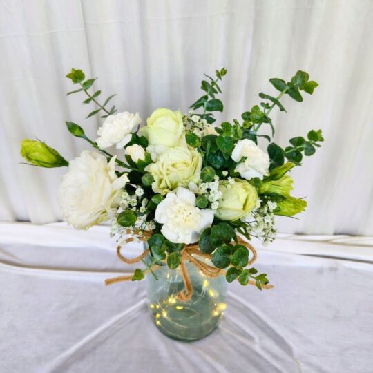Jar with Lights and White Flowers for gifting and table decor.