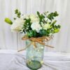 Jar with Lights and White Flowers for gifting and table decor.
