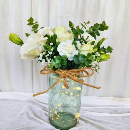 Jar with Lights and White Flowers for gifting and table decor.