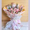 Elegant bouquet of blush pink roses in premium artistic wrapping