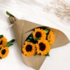 Fresh sunflower bouquet wrapped in brown kraft paper by premium florist in Bangalore
