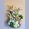 Elegant flower basket with lilies, eustoma, hydrangea, and white blooms by premium florist in Bangalore
